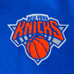 NBA NEW YORK KNICKS RETRO CLASSIC BLOUSON COLLÉGIAL EN LAINE À BORDS CÔTELÉS POUR FEMME (BLEU ROYAL/ORANGE/BLEU ROYAL)