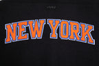 NBA NEW YORK KNICKS CLASSIC BLOUSON COLLÉGIAL EN LAINE POUR FEMME (NOIR/BLANC)