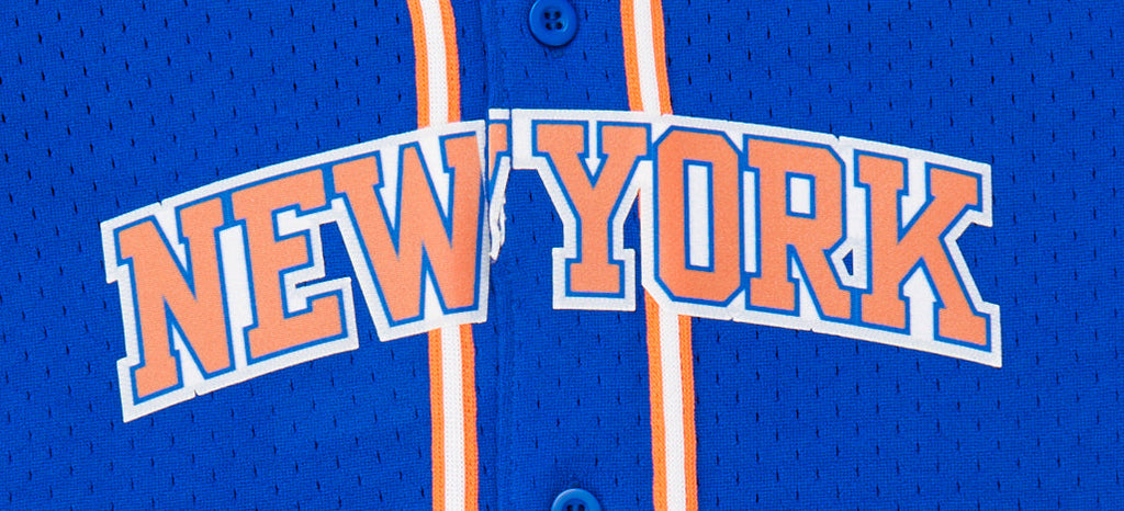 NBA NEW YORK KNICKS CLASSIC CHEMISE BOUTONNÉE EN FILET POUR GARÇON ENFANT (BLEU ROYAL/ORANGE)