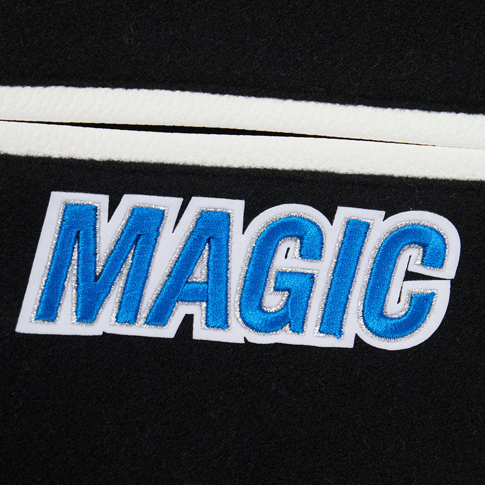 NBA ORLANDO MAGIC CLASSIC BLOUSON COLLÉGIAL EN LAINE POUR GARÇON JUNIOR (NOIR/BLANC)