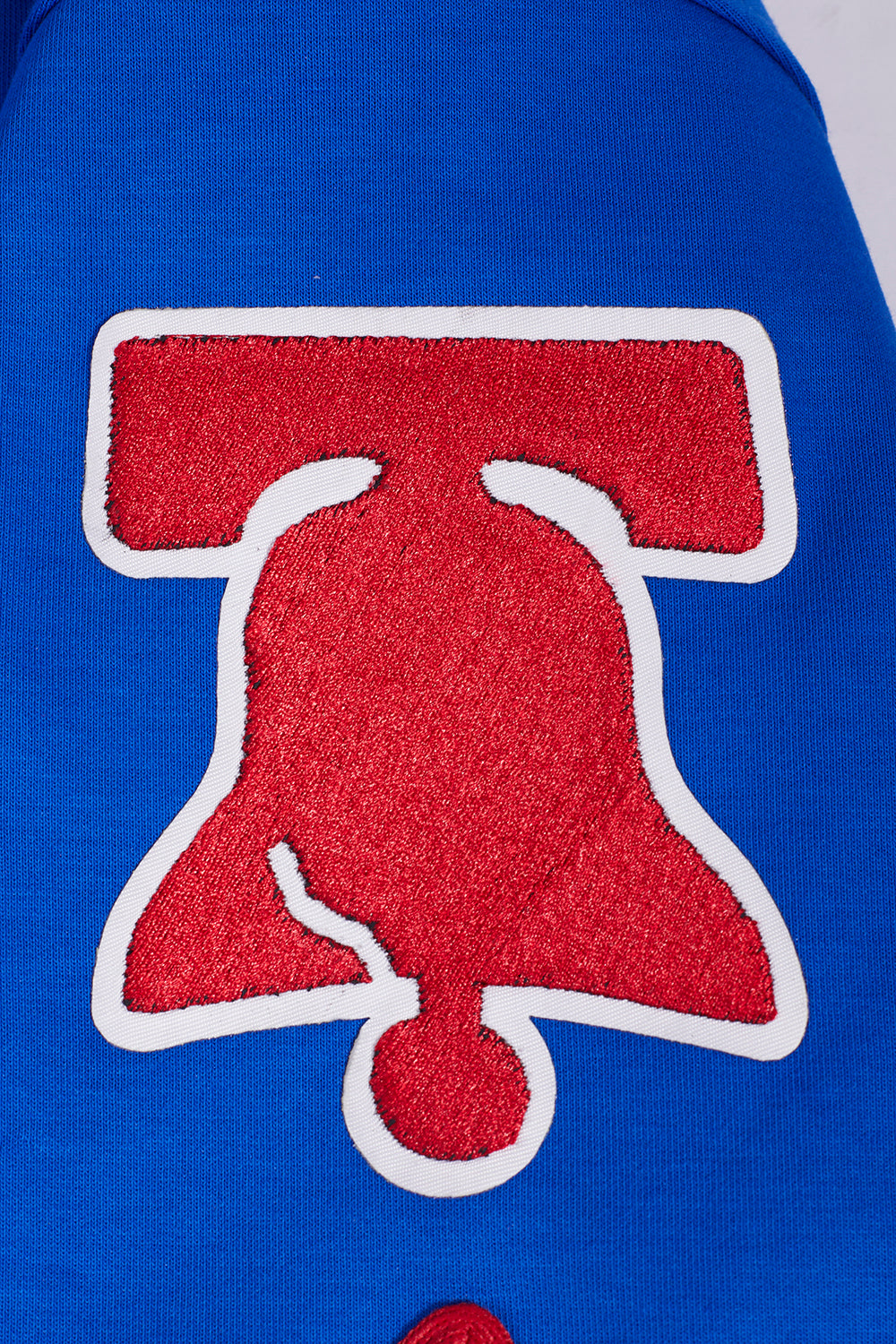 NBA PHILADELPHIA 76ERS CLASSIC BLOUSON PRO EN MAILLE DOUBLE À MANCHES COURTES POUR HOMME (BLEU ROYAL/ROUGE)