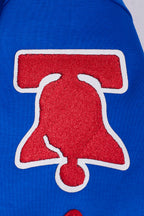 NBA PHILADELPHIA 76ERS CLASSIC BLOUSON PRO EN MAILLE DOUBLE À MANCHES COURTES POUR HOMME (BLEU ROYAL/ROUGE)