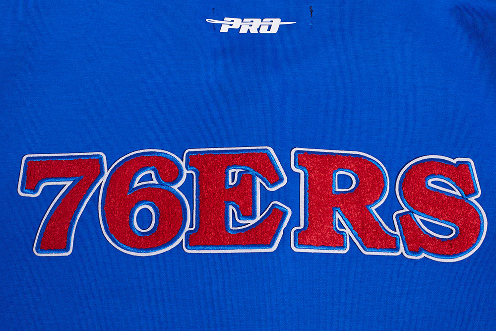 NBA PHILADELPHIA 76ERS CLASSIC BLOUSON PRO EN MAILLE DOUBLE À MANCHES COURTES POUR HOMME (BLEU ROYAL/ROUGE)