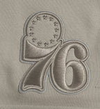 NBA PHILADELPHIA 76ERS NEUTRAL MEN'S SHORT (TAUPE)