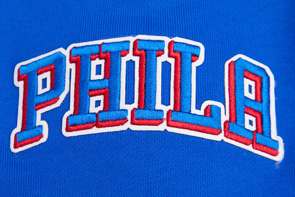 NBA PHILADELPHIA 76ERS SCRIPT TAIL CHANDAIL À CAPUCHON EN MOLLETON CÔTELÉ POUR HOMME (BLEU ROYAL/ROUGE)