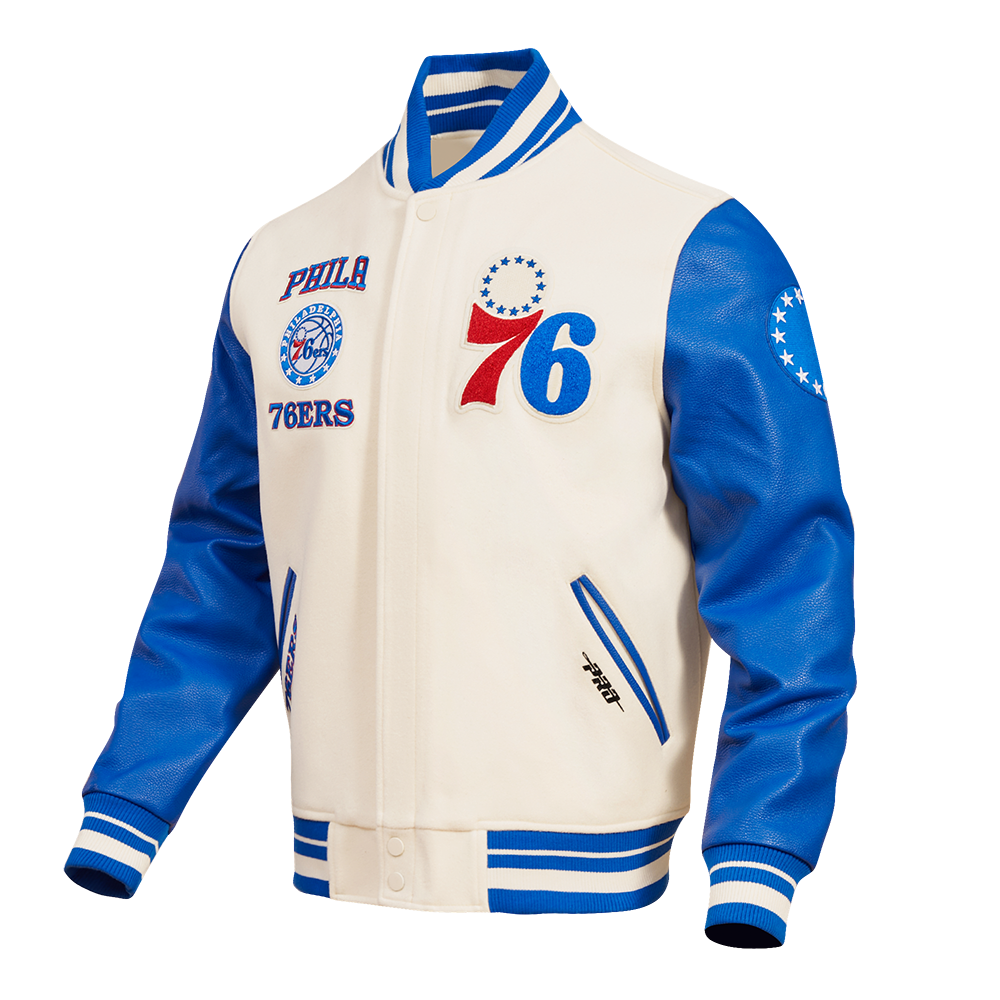 NBA PHILADELPHIA 76ERS RETRO CLASSIC BLOUSON COLLÉGIAL EN LAINE À BORDS CÔTELÉS POUR HOMME (COQUILLE D'ŒUF/BLEU ROYAL)