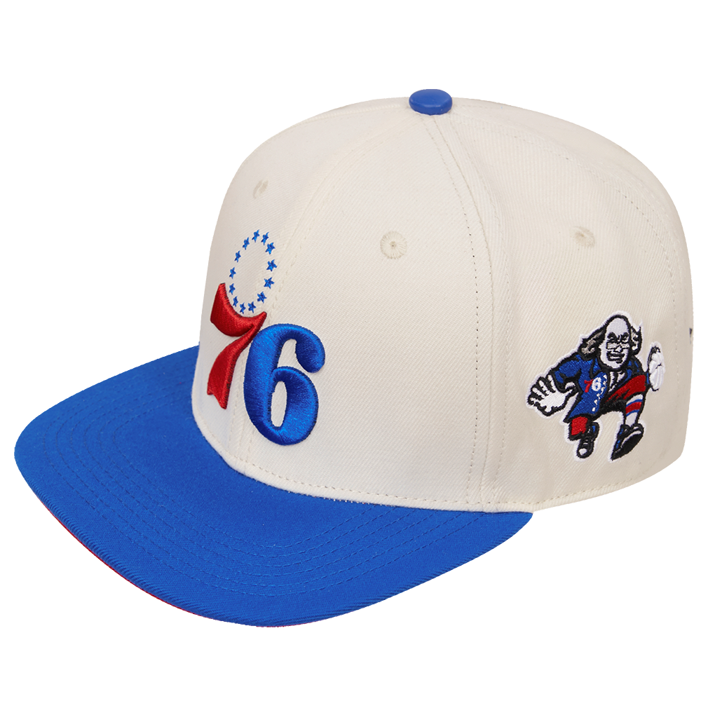 NBA PHILADELPHIA 76ERS RETRO CLASSIC UNISEX PRIMARY LOGO WOOL SNAPBACK (EGGSHELL/ ROYAL BLUE)