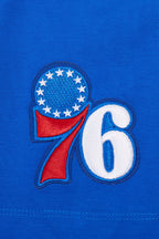 NBA PHILADELPHIA 76ers SCRIPT TAIL WOMEN'S SINGLE JERSEY BOXY TEE (ROYAL BLUE)