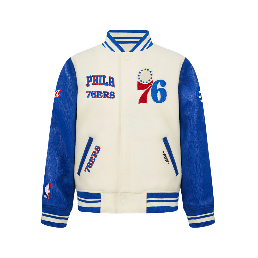 NBA PHILADELPHIA 76ERS RETRO CLASSIC BLOUSON COLLÉGIAL EN LAINE À BORDS CÔTELÉS POUR GARÇON JUNIOR (COQUILLE D'ŒUF/BLEU ROYAL)