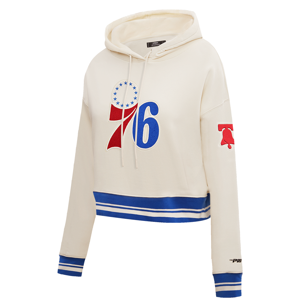 NBA PHILADELPHIA 76ERS RETRO CLASSIC WOMEN'S CROPPED PULLOVER HOODIE (EGGSHELL/ROYAL BLUE)