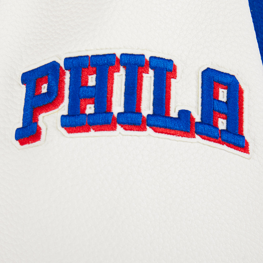 NBA PHILADELPHIA 76ERS CLASSIC BLOUSON COLLÉGIAL EN LAINE POUR GARÇON ENFANT (BLEU ROYAL/BLANC)