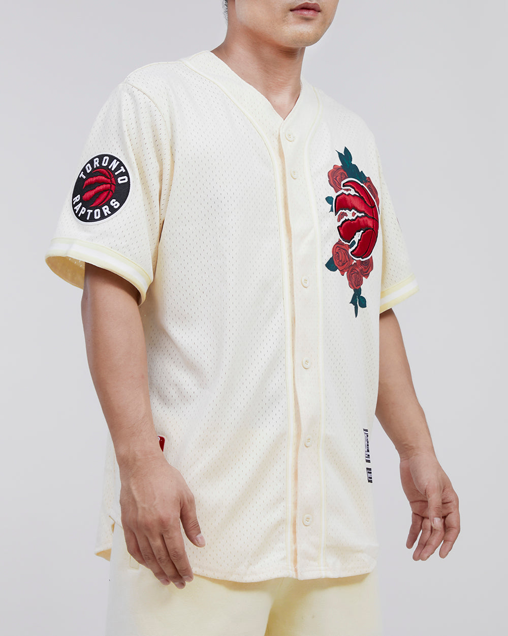 NBA TORONTO RAPTORS ROSES MEN'S MESH BUTTON DOWN JERSEY (EGGSHELL)