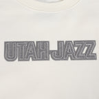 NBA UTAH JAZZ REVERSE FRENCH TERRY CHANDAIL À COL ROND EN MOLLETON À ÉPAULES TOMBANTES POUR HOMME (COQUILLE D'ŒUF)