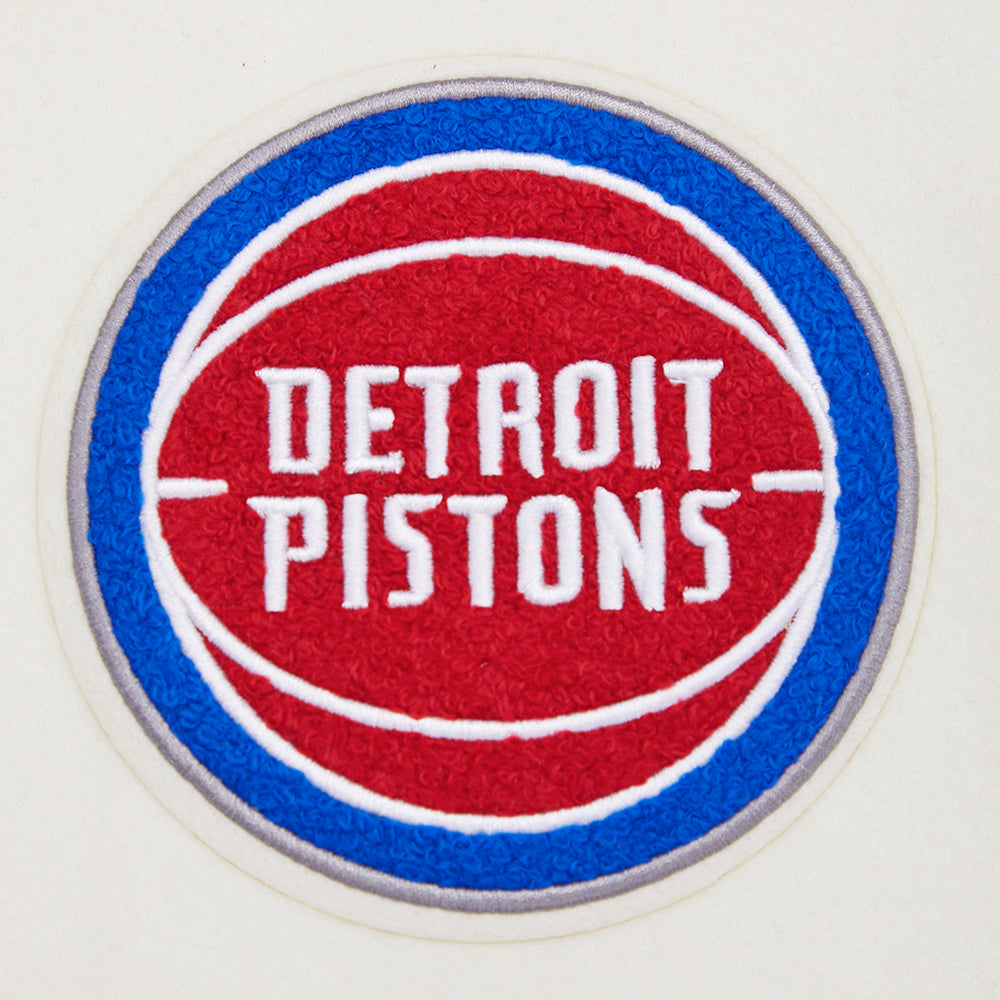 NBA DETROIT PISTONS RETRO CLASSIC BLOUSON COLLÉGIAL EN LAINE À BORDS CÔTELÉS POUR FEMME (COQUILLE D'ŒUF/BLEU ROYAL)