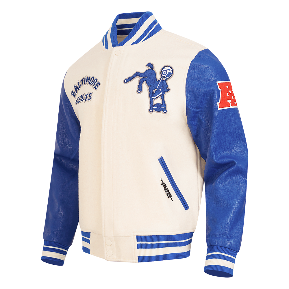 NFL BALTIMORE COLTS RETRO CLASSIC BLOUSON COLLÉGIAL EN LAINE À BORDS CÔTELÉS POUR HOMME (COQUILLE D'ŒUF/BLEU ROYAL)