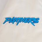 NFL CAROLINA PANTHERS RETRO CLASSIC BLOUSON EN SATIN À BORDS CÔTELÉS POUR FEMME (COQUILLE D'ŒUF/NOIR)