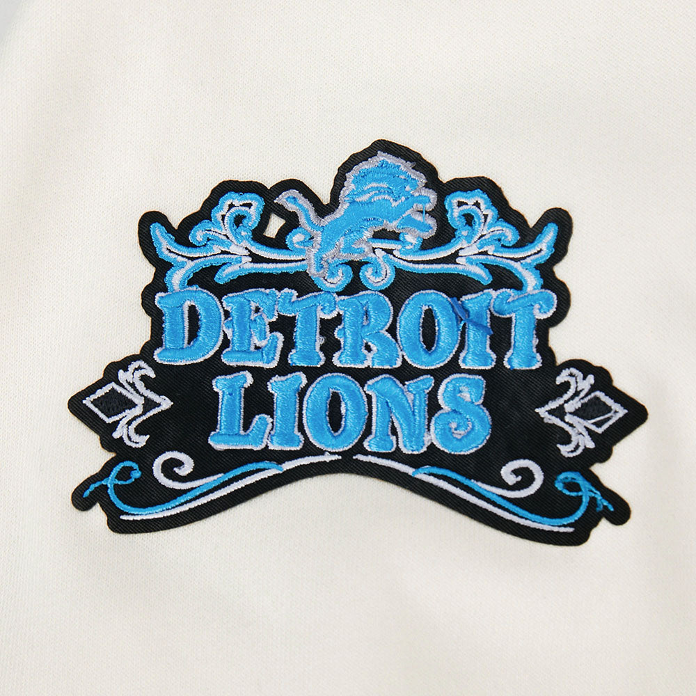 NFL DETROIT LIONS REBEL ATHLETICS CHANDAIL À COL ROND EN MOLLETON POUR FEMME (COQUILLE D'ŒUF)