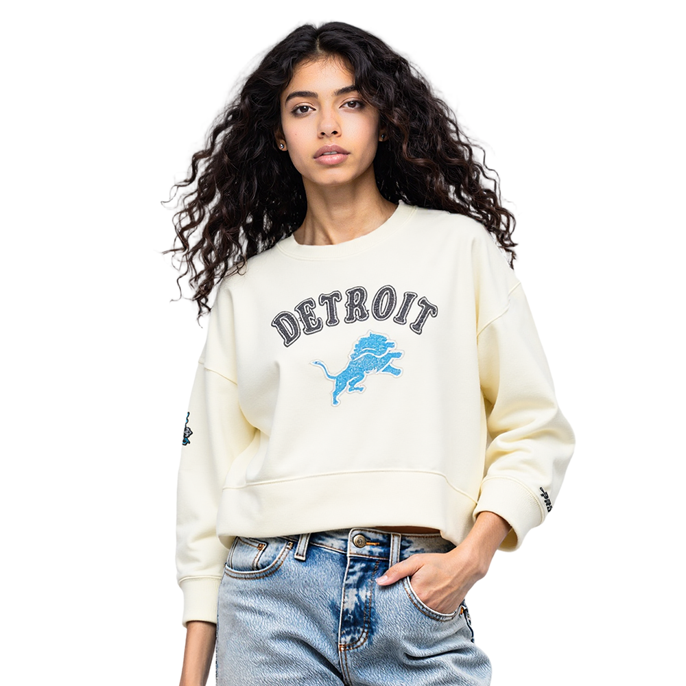 NFL DETROIT LIONS REBEL ATHLETICS CHANDAIL À COL ROND EN MOLLETON POUR FEMME (COQUILLE D'ŒUF)