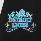 NFL DETROIT LIONS REBEL ATHLETICS CHANDAIL À CAPUCHON COURT EN MOLLETON POUR FEMME (NOIR)
