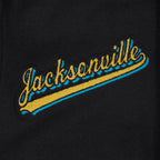NFL JACKSONVILLE JAGUARS SCRIPT TAIL BLOUSON COLLÉGIAL POUR HOMME (NOIR/BLANC)