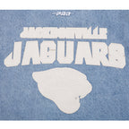 NFL JACKSONVILLE JAGUARS VARSITY BLUES WOMEN'S DENIM VARSITY JACKET (DENIM/LINEN)