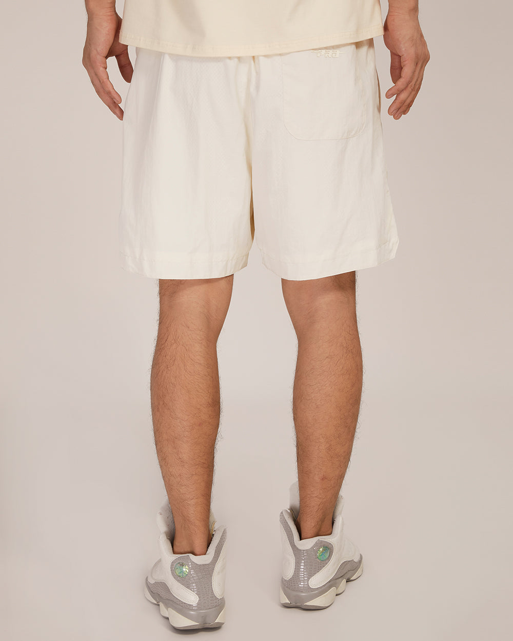 NFL KANSAS CITY CHIEFS NEUTRAL 2.0 MEN'S WOVEN SHORT (EGGSHELL)