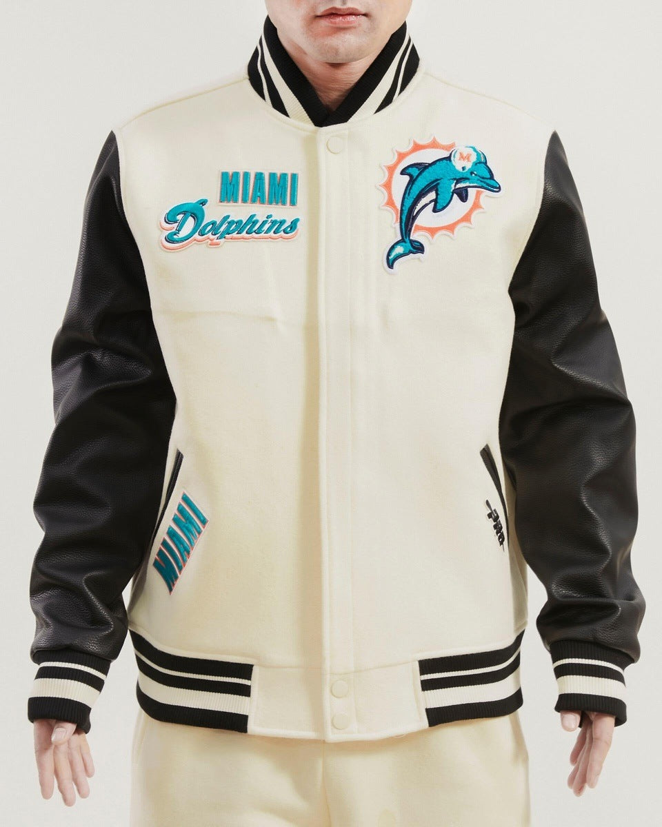 NFL MIAMI DOLPHINS RETRO CLASSIC BLOUSON COLLÉGIAL EN LAINE À BORDS CÔTELÉS POUR HOMME (COQUILLE D'ŒUF/NOIR)