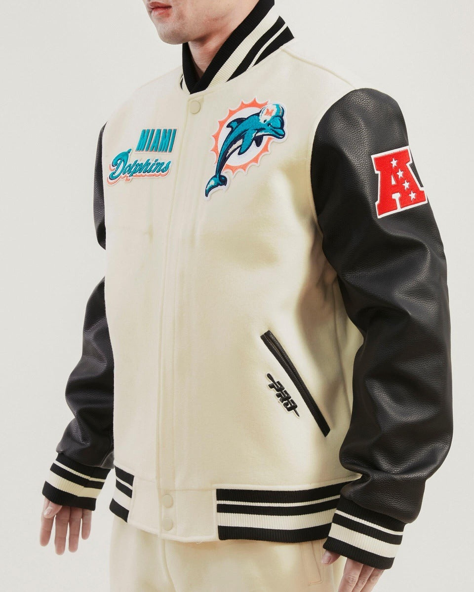 NFL MIAMI DOLPHINS RETRO CLASSIC BLOUSON COLLÉGIAL EN LAINE À BORDS CÔTELÉS POUR HOMME (COQUILLE D'ŒUF/NOIR)