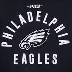 NFL PHILADELPHIA EAGLES WOMEN'S VARSITY JACKET (BLACK/WHITE)