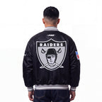 NFL OAKLAND RAIDERS RETRO CLASSICS MANTEAU POUR HOMME (NOIR/GRIS)