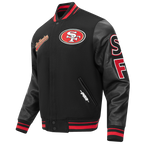 NFL SAN FRANCISCO 49ERS SCRIPT TAIL BLOUSON COLLÉGIAL POUR HOMME (NOIR/ROUGE/NOIR)