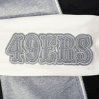 NFL SAN FRANCISCO 49ERS REVERSE FRENCH TERRY CHANDAIL À CAPUCHON EN MOLLETON À GLISSIÈRE ET À BLOCS DE COULEUR POUR FEMME (NOIR/GRIS/COQUILLE D'ŒUF)