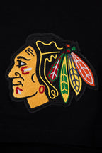 NHL CHICAGO BLACKHAWKS SCRIPT TAIL T-SHIRT EN JERSEY SIMPLE POUR HOMME (NOIR)