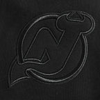 NHL NEW JERSEY DEVILS NEUTRAL SHORT EN MOLLETON POUR HOMME (NOIR)