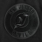 NHL NEW JERSEY DEVILS NEUTRAL SHORT EN MOLLETON POUR HOMME (NOIR)