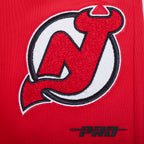 NHL NEW JERSEY DEVILS CLASSIC CHENILLE PANTALON D'ENTRAÎNEMENT EN MAILLE DOUBLE POUR HOMME (ROUGE/NOIR)