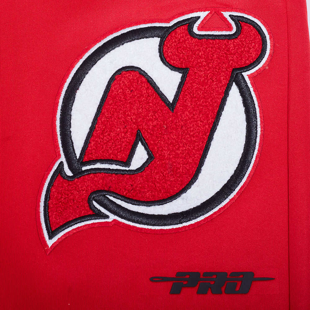 NHL NEW JERSEY DEVILS CLASSIC CHENILLE PANTALON D'ENTRAÎNEMENT EN MAILLE DOUBLE POUR HOMME (ROUGE/NOIR)