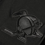 NHL PITTSBURGH PENGUINS NEUTRAL T-SHIRT EN JERSEY DE COTON À ÉPAULES TOMBANTES POUR HOMME (NOIR)