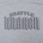 NHL SEATTLE KRAKEN NEUTRAL T-SHIRT EN JERSEY SIMPLE À COUPE CARRÉE (GRIS CHINÉ FONCÉ)