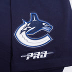 NHL VANCOUVER CANUCKS CLASSIC CHENILLE T-SHIRT EN JERSEY SIMPLE POUR HOMME (MARINE MINUIT)