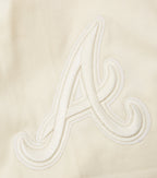 MLB ATLANTA BRAVES NEUTRAL HAUT À ÉPAULES TOMBANTES POUR HOMME (COQUILLE D'ŒUF)