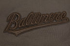 MLB BALTIMORE ORIOLES NEUTRAL MEN'S  CJ DROP SHOULDER TOP (DARK TAUPE)