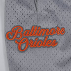 MLB BALTIMORE ORIOLES SOUVENIR SHORT EN FILET POUR HOMME (GRIS)