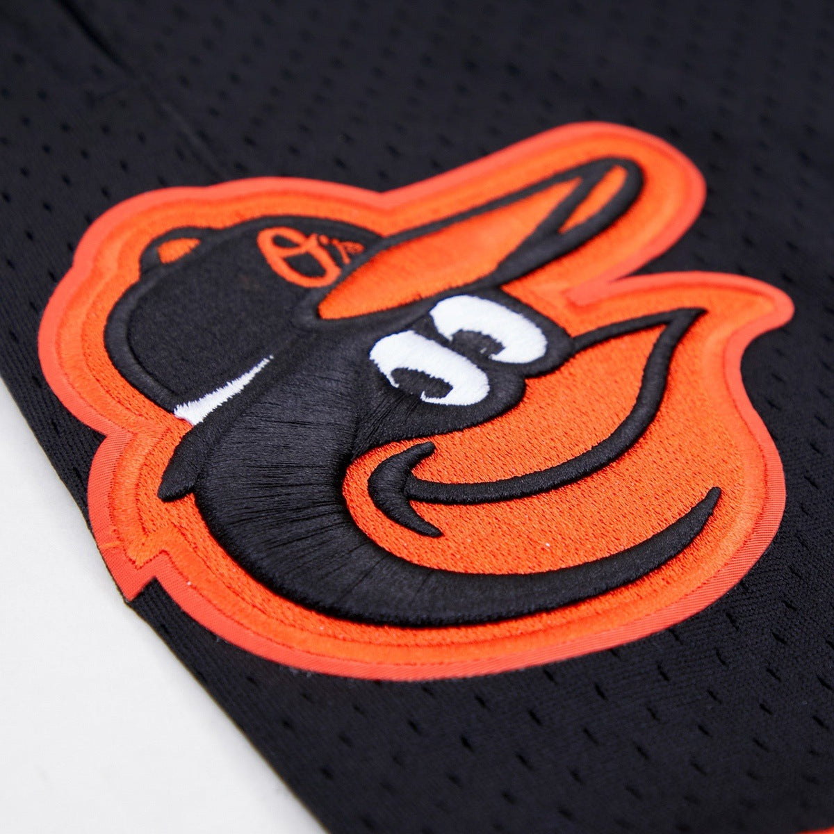 MLB BALTIMORE ORIOLES MESH SHORT À LOGO (NOIR)