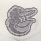 MLB BALTIMORE ORIOLES REVERSE FRENCH TERRY CHANDAIL À CAPUCHON EN MOLLETON À BLOCS DE COULEUR POUR HOMME (NOIR/GRIS/COQUILLE D'ŒUF)