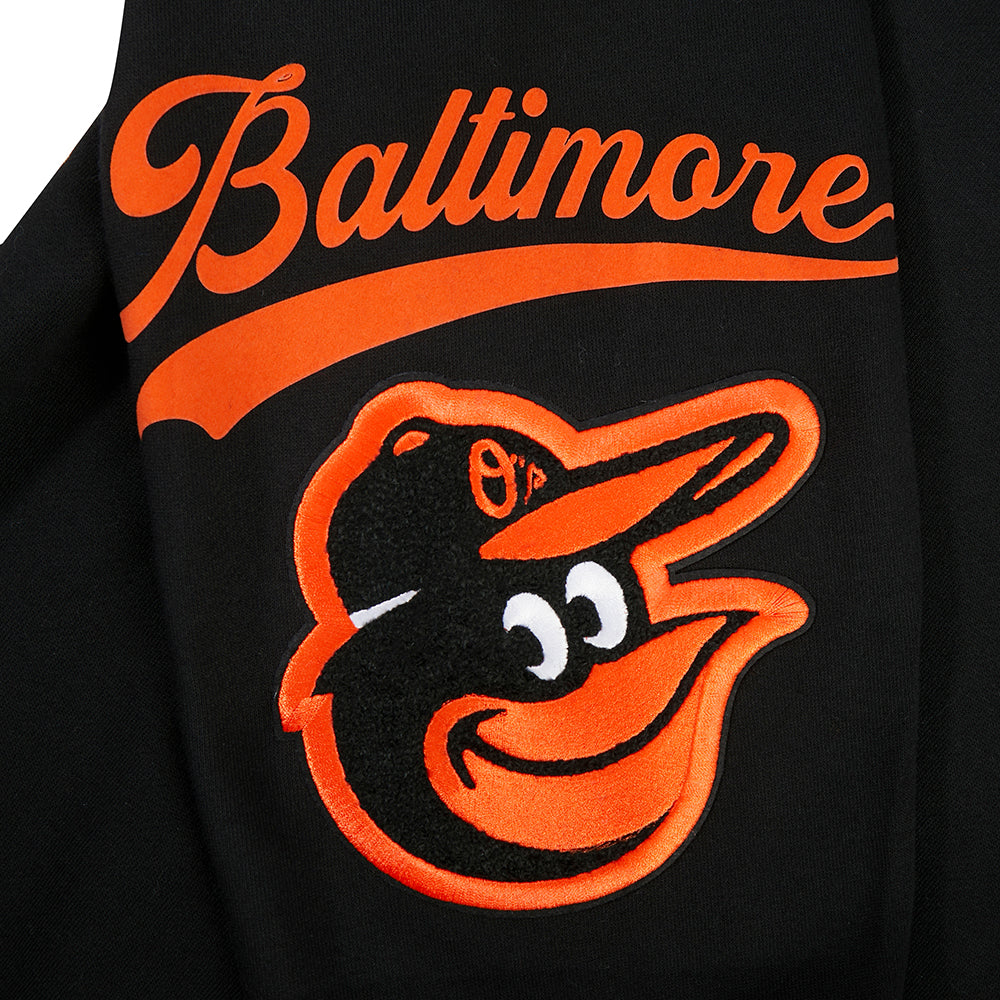 MLB BALTIMORE ORIOLES LIVING LARGE CHANDAIL À CAPUCHON EN MOLLETON À ÉPAULES TOMBANTES POUR HOMME (NOIR)
