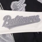 MLB BALTIMORE ORIOLES REVERSE FRENCH TERRY CHANDAIL À CAPUCHON EN MOLLETON À GLISSIÈRE ET À BLOCS DE COULEUR POUR FEMME (NOIR/GRIS/COQUILLE D'ŒUF)