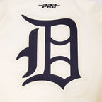 MLB DETROIT TIGERS RETRO CLASSICS BLOUSON PRO EN SATIN À BORDS CÔTELÉS TEINTS EN FIL POUR HOMME (COQUILLE D'ŒUF/MARINE MINUIT)