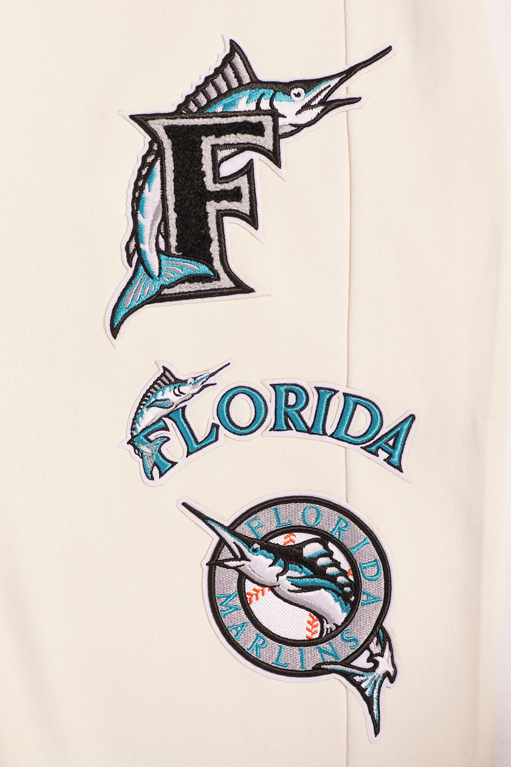 MLB FLORIDA MARLINS RETRO CLASSIC PANTALON OUATÉ POUR HOMME (COQUILLE D'ŒUF/NOIR)